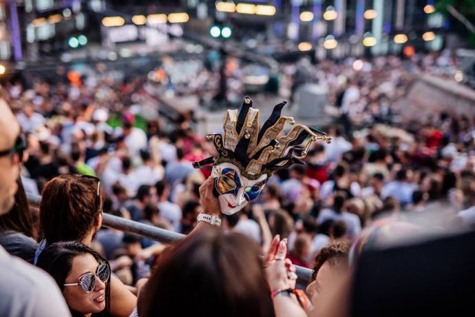 Boris Brejcha's mask in the festival crowd.